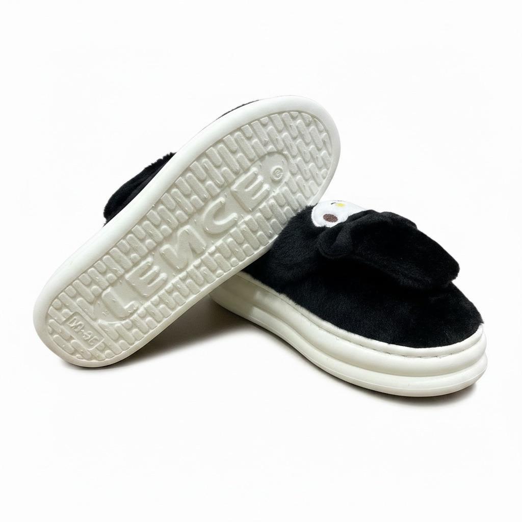 LEMCE Cloudstep black plush slippers pair showing white textured sole and fuzzy upper side view