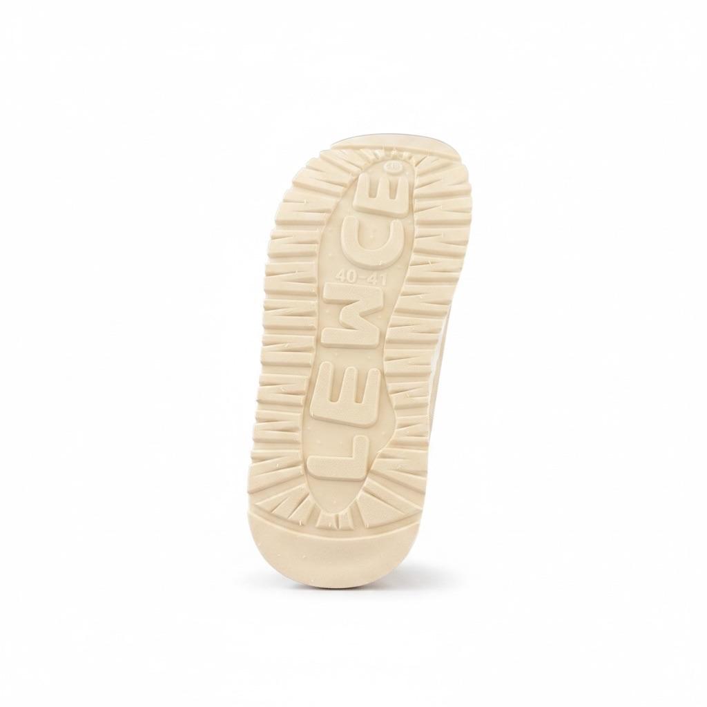 LEMCE Cloudstep plush slipper cream rubber outsole with ribbed grip texture bottom view
