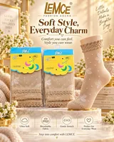 LEMCE Dottie Sheer Socks beige floral dot lace cuff women's crew socks packaged and worn view