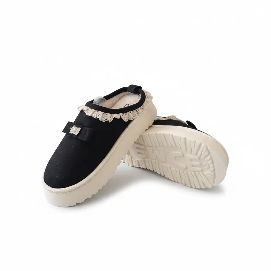 LEMCE Cloudstep black plush slippers with lace trim bow and cream sole pair angled view