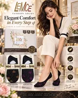LEMCE Noir Elegance black shimmer no-show footies with glitter heart detail on woman's feet